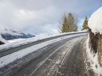 Snow-Covered Mountain Road in Winter