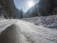 Snow-Covered Mountains and Straight Road in the Swiss Alps