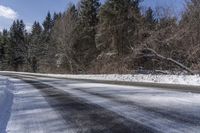 Snow Covered Road in Forest, Canadian Landscape