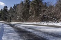 Snow Covered Road in Forest, Canadian Landscape