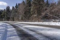 Snow Covered Road in Forest, Canadian Landscape