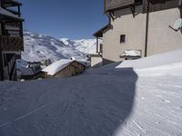 Snow Covered Road in a Mountain Landscape: French Alps