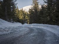 Snow Covered Road in the Swiss Alps - Winter