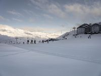 Snow Covered Slope in the Alps under a Clear Sky