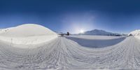 a snowboarder is in mid air doing a trick at the top of a ramp