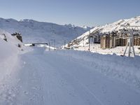 Snowy Alps under a Clear Sky