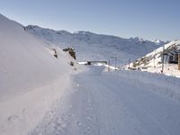 Snowy Alps under a Clear Sky