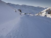 Snowy Alps under a Clear Sky