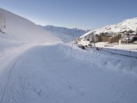 Snowy Alps under a Clear Sky