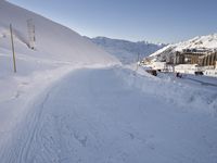 Snowy Alps under a Clear Sky