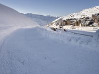 Snowy Alps under a Clear Sky