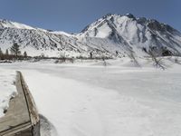 Snowy Alps: Clear Sky Over the Majestic Mountain Range