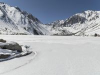 Snowy Alps: Clear Sky Over the Majestic Mountain Range