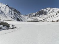 Snowy Alps: Clear Sky Over the Majestic Mountain Range