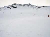 Snowy Alps Landscape Under a Gloomy Sky