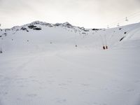 Snowy Alps Landscape Under a Gloomy Sky