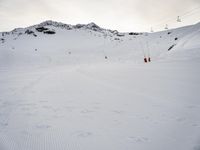 Snowy Alps Landscape Under a Gloomy Sky