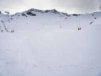 Snowy Alps Landscape Under a Gloomy Sky