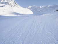 Snowy Alps: A Mountain Range under a Clear Sky