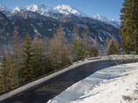 Snowy Alps Switzerland Winding Road 001