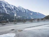 Snowy Road in Germany: Asphalt and Water Reflection