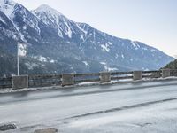 Snowy Road in Germany: Asphalt and Water Reflection