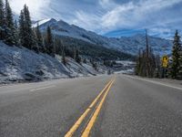 Snowy Road in Colorado: Forest and Mountain Scenery