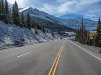 Snowy Road in Colorado: Forest and Mountain Scenery