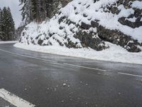 Snowy Road through Mountains