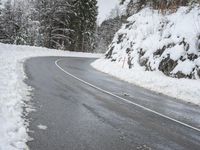 Snowy Road through Mountains