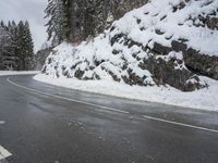 Snowy Road through Mountains