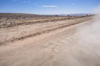 South African Desert: Barren Terrain and Endless Road