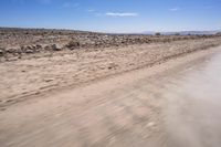 South African Desert: Barren Terrain and Endless Road