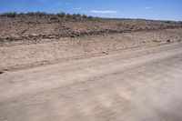 South African Desert: Barren Terrain and Endless Road