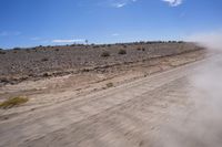 South African Desert: Barren Terrain and Endless Road