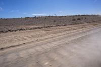 South African Desert: Barren Terrain and Endless Road