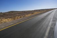 South African Road: Desert, Clear Sky, and Dawn Horizon