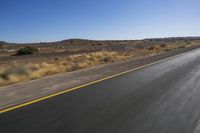 South African Road: Desert, Clear Sky, and Dawn Horizon