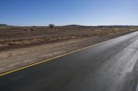 South African Road: Desert, Clear Sky, and Dawn Horizon