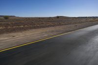 South African Road: Desert, Clear Sky, and Dawn Horizon