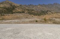 South Island Dirt Road: Surrounded by Majestic Mountains