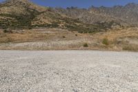 South Island Dirt Road: Surrounded by Majestic Mountains