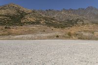 South Island Dirt Road: Surrounded by Majestic Mountains