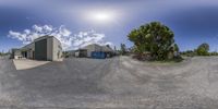 a fish eye lens is shown of the intersection of two buildings on the other side of this street