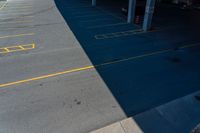 a parking garage with a lot of space and the yellow lines are painted across the ground