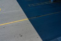 a parking garage with a lot of space and the yellow lines are painted across the ground