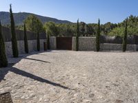 Spain's Architecture: Garden with Stone Wall