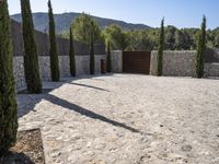 Spain's Architecture: Garden with Stone Wall