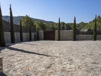 Spain's Architecture: Garden with Stone Wall