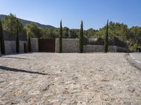 Spain's Architecture: Garden with Stone Wall